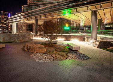 Rolex Plaza exterior landscaping at night