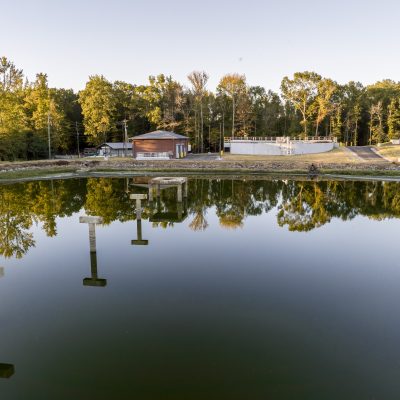 gravel ridge improvements by the lake with trees